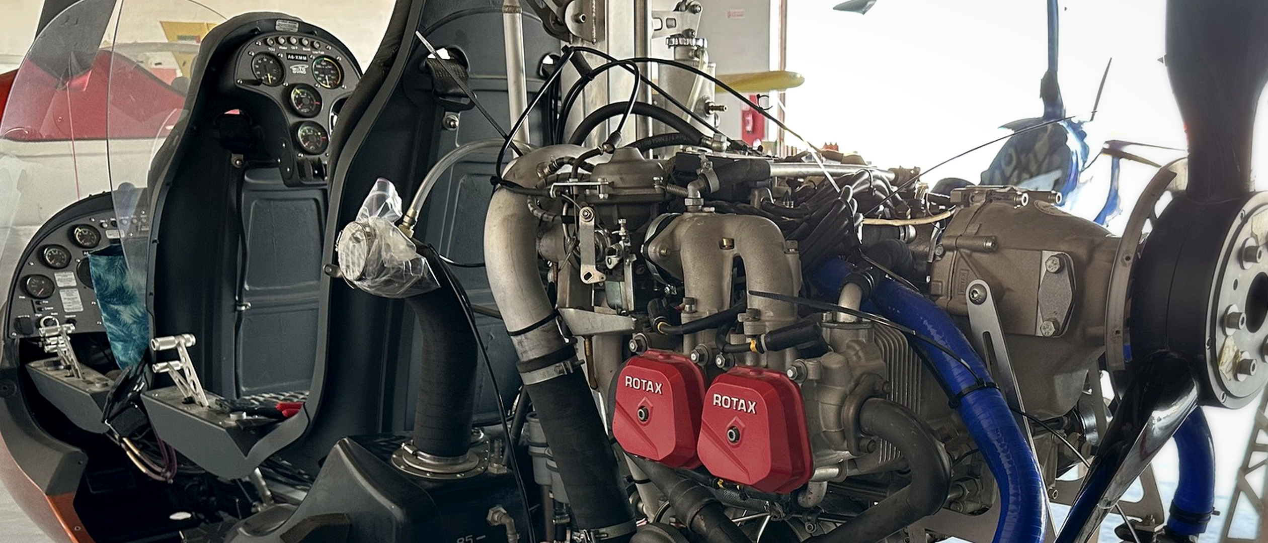 Close-up real photo of a Rotax engine installation on a gyrocopter used as REAH flying-laboratory reference hardware
